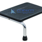 Hospital single step foot stool with a black ribbed rubber tread on a chrome-plated tubular steel frame with rubber feet