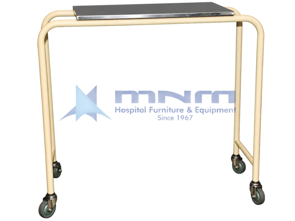 Hospital overbed table with a stainless steel top on a cream powder-coated tubular steel frame, open on one side, on four swivel castors