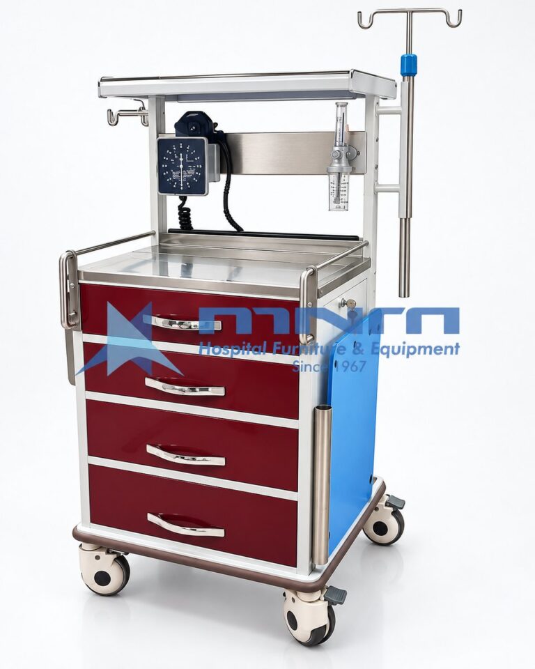 Anaesthesia trolley with maroon drawer fronts, overhead gantry shelf, aneroid BP monitor, oxygen flowmeter, IV pole and side cylinder holder on castors