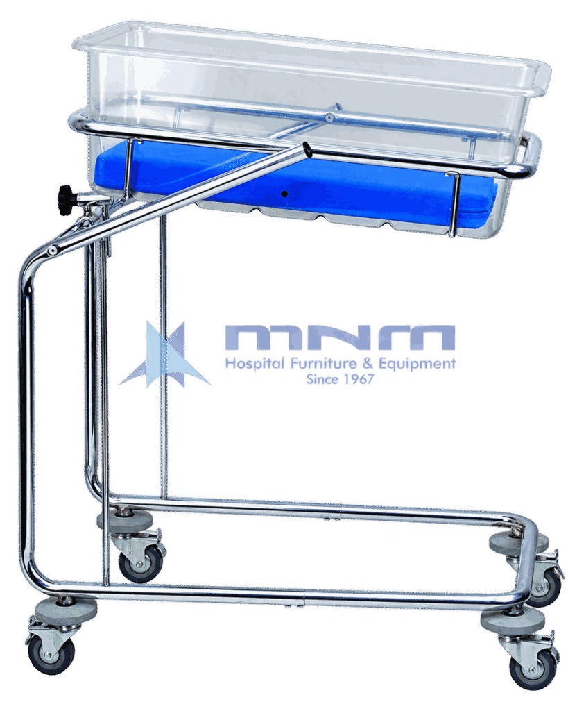Baby cot with clear acrylic crib and blue mattress on a chrome tilting frame with a side tilt knob and six castors