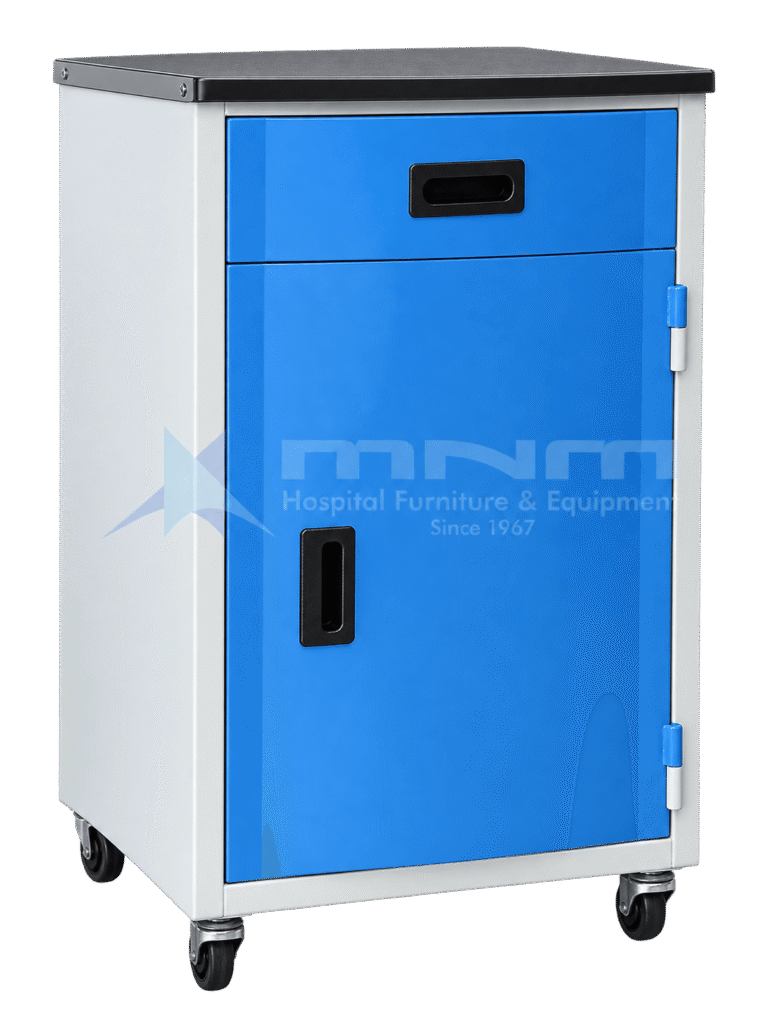 Hospital bedside locker with white powder-coated body, blue drawer and cupboard door with recessed black handles, dark laminate top and four castors