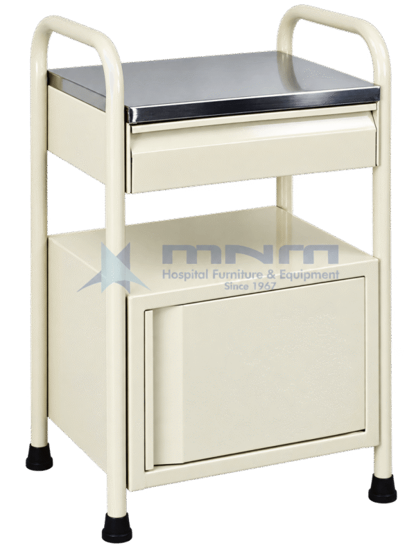 Cream hospital bedside locker built into a tubular steel frame with handles at both ends, a stainless steel top, one drawer and a cupboard, standing on four legs