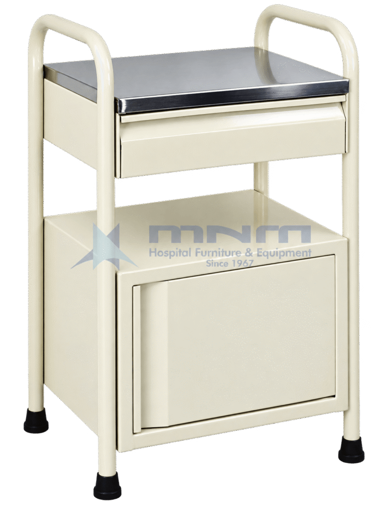 Cream hospital bedside locker built into a tubular steel frame with handles at both ends, a stainless steel top, one drawer and a cupboard, standing on four legs
