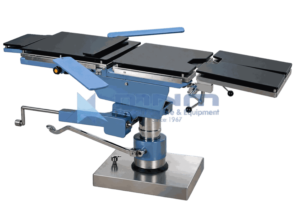 Hydraulic operating table in the flat position with head and leg extensions fitted and an arm board to one side
