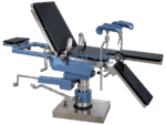 Hydraulic operating table with backrest raised upright, leg sections lowered and padded stirrups fitted for lithotomy positioning