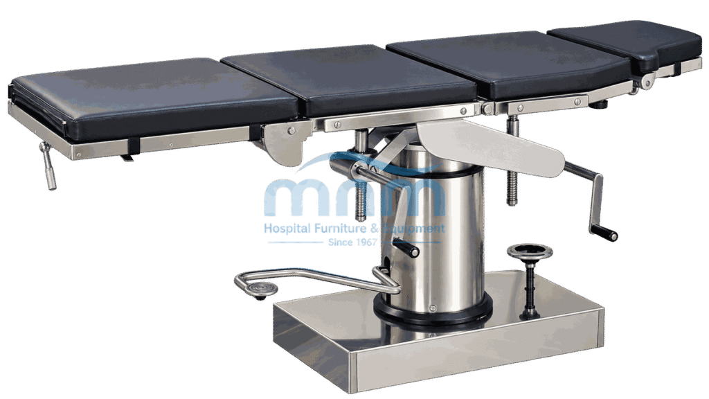 Operating table with plain navy four section upholstered top on a cylindrical stainless column and square box base with foot pump lever