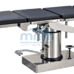 Operating table with plain navy four section upholstered top on a cylindrical stainless column and square box base with foot pump lever