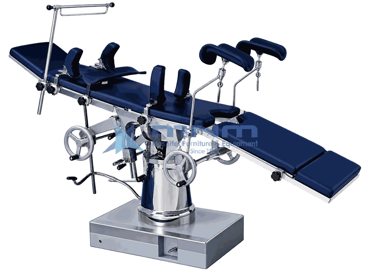 Operating Table with Twin Handwheels and Stirrups Operating table with navy upholstered top, padded stirrups and anaesthetic screen, controlled by twin handwheels on a conical chrome column and box base