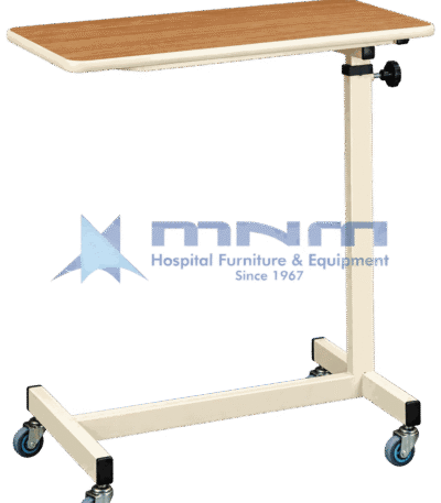 Hospital overbed table with wood-effect laminate top, moulded edge trim, cream powder-coated column with knob height lock and an H-shaped base on four castors