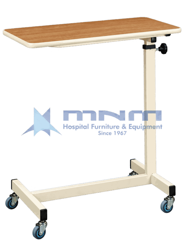 Hospital overbed table with wood-effect laminate top, moulded edge trim, cream powder-coated column with knob height lock and an H-shaped base on four castors