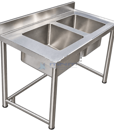 Stainless steel double bowl sink table on four tubular legs with a rear backsplash and lower cross bracing