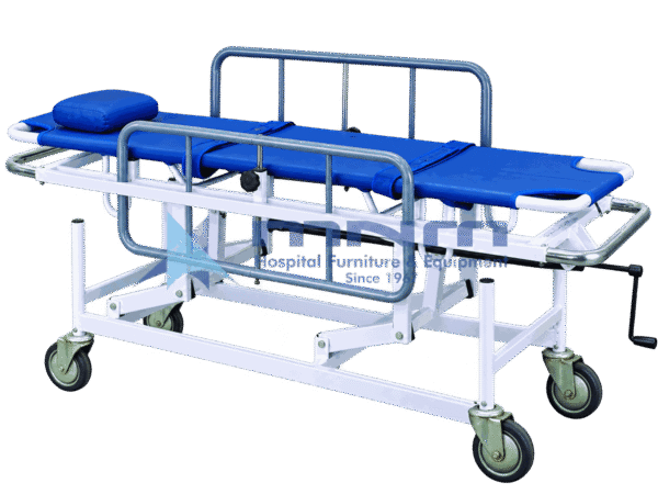 Stretcher trolley with a detachable blue canvas stretcher, pillow, restraint straps, grey drop-down side rails and a hand crank on a wheeled base