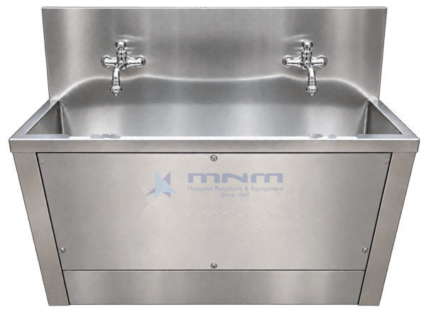 Stainless steel two station wall mounted scrub sink with a long trough, two chrome cross-handle taps on the backsplash and a screwed front access panel