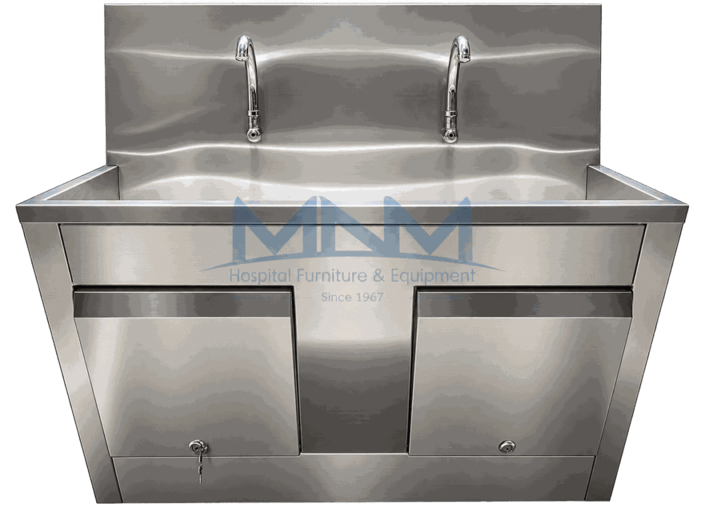 Stainless steel two station scrub sink with twin gooseneck taps, wave-profile backsplash and a lockable cabinet beneath the trough
