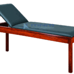 Examination couch with polished hardwood frame, dark green upholstery and backrest raised on a metal strut