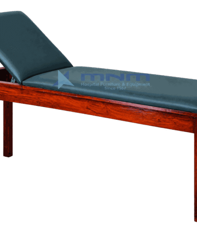 Examination couch with polished hardwood frame, dark green upholstery and backrest raised on a metal strut