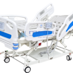 Five function motorized hospital bed with backrest raised, nursing control panel on the ABS foot board and handheld remote on the side rail